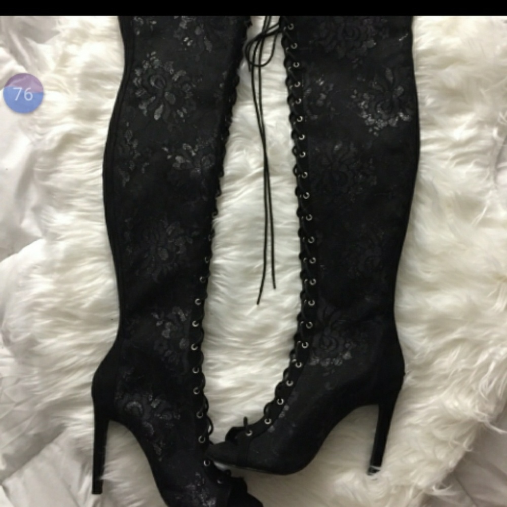 Thigh-high lace-up boots